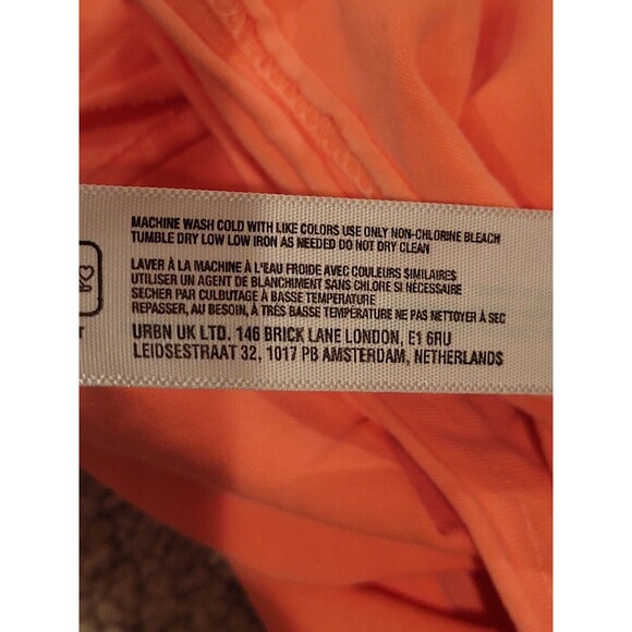 NWOT Free People Movement Hot Shot Tee Romper Neon Coral Small Oversize - Picture 8 of 9